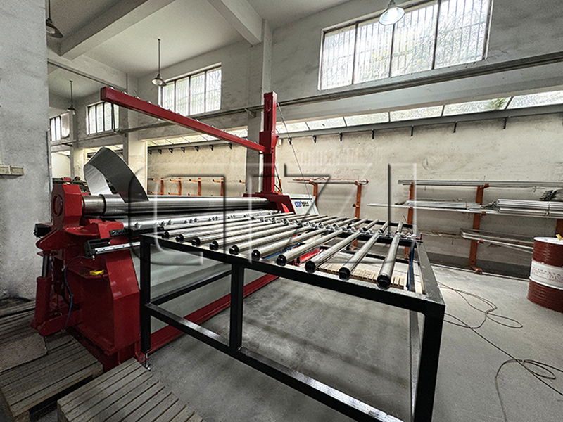 Four-roller rolling machine line for coiling coned 
